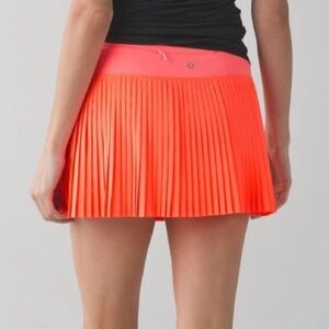 Lululemon Pleat to Street coral pink orange run skirt tennis skort shorts sz 6